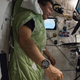 Astronaut Koichi Wakata, Expedition 38 Flight Engineer, strapped into his sleeping bag in his sleep station on board the ISS.